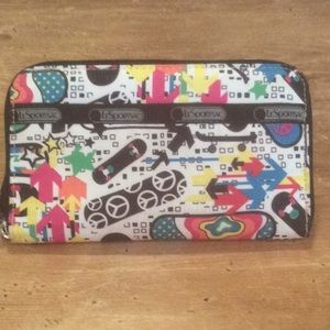 Lesportsac wrap around zipper wallet.